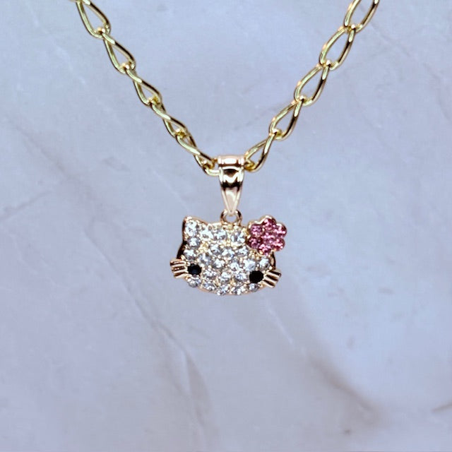 HK doll face necklace