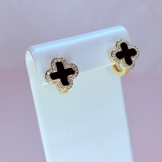 black trebol huggie earrings