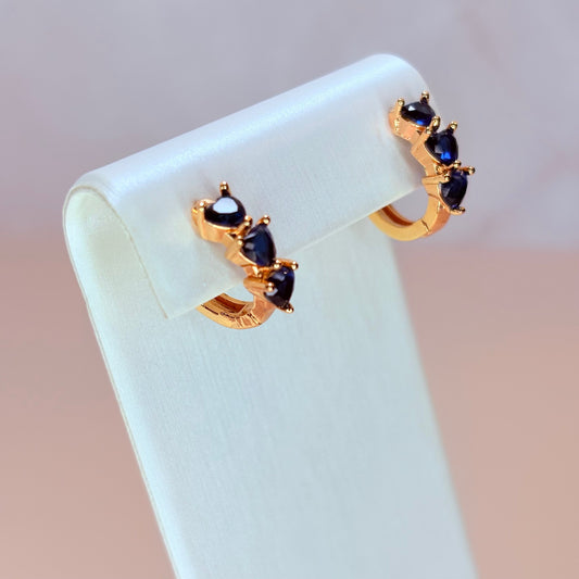 blue heart huggie-style earrings