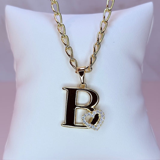 gold initial with pave heart