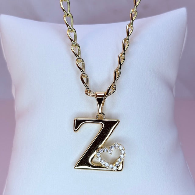 gold initial with pave heart