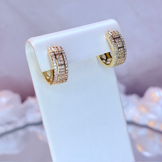 iced out luxe huggie earrings