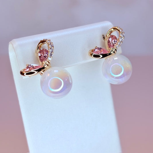 iridescent bow pearl earrings
