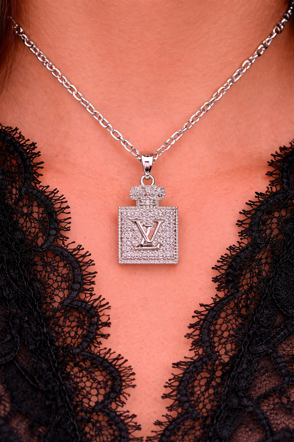 silver LV necklace