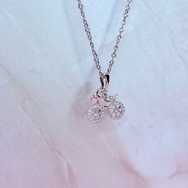 silver sparkle bicycle necklace