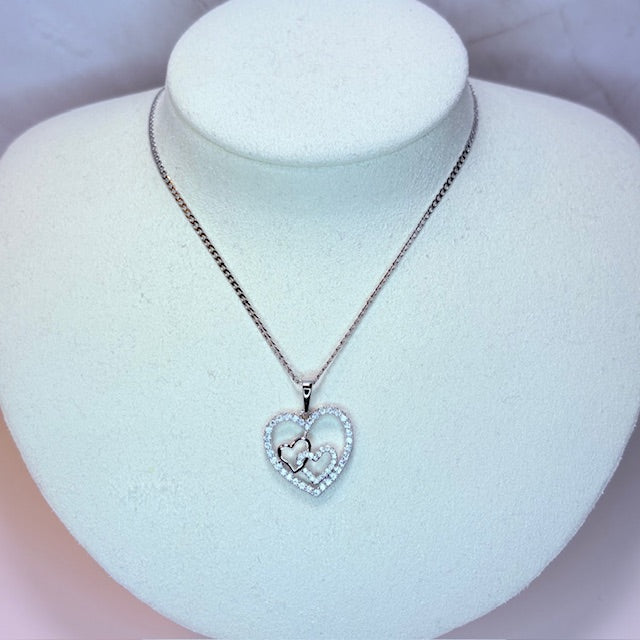 silver dainty triple heart necklace