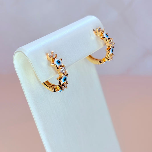 white star evil eye huggie earrings