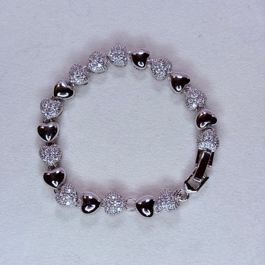 corazon de plata bracelet