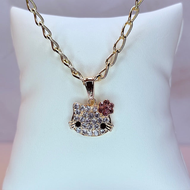HK doll face necklace