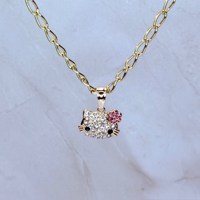 HK doll face necklace