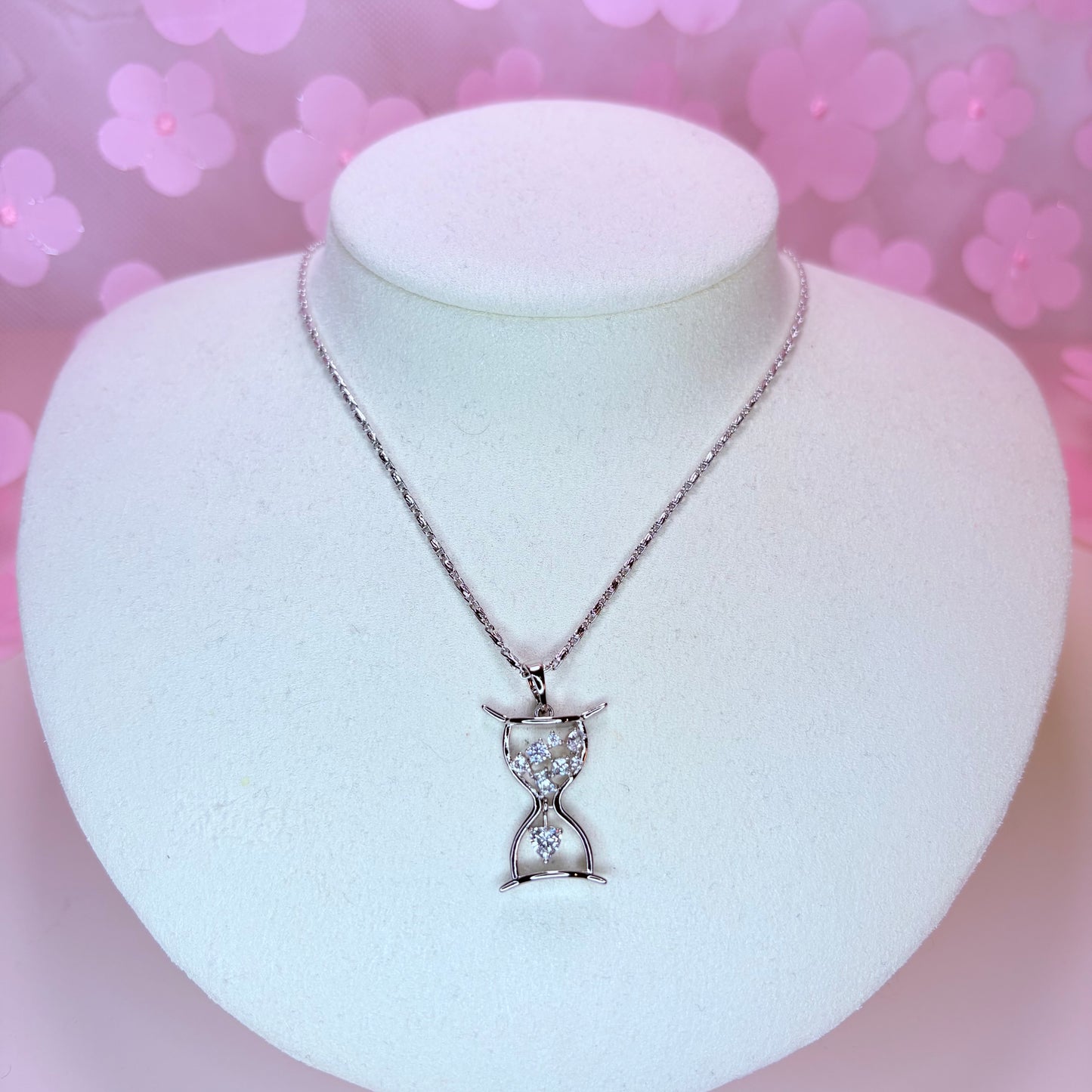 silver hourglass necklace