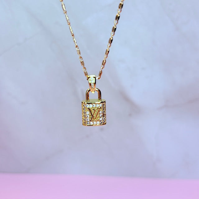 LV golden lock necklace