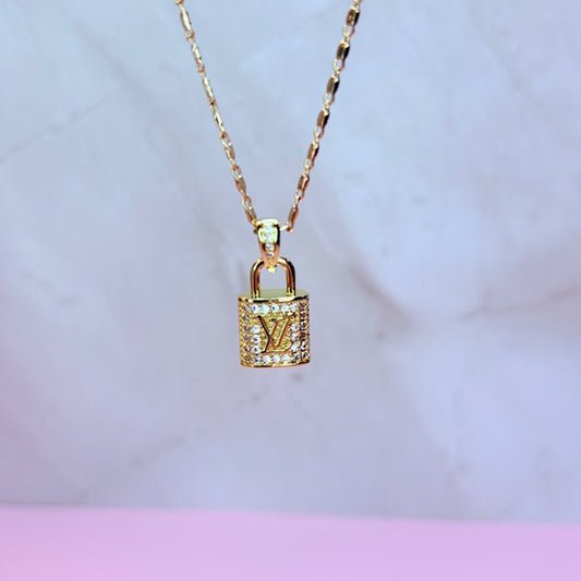 LV golden lock necklace