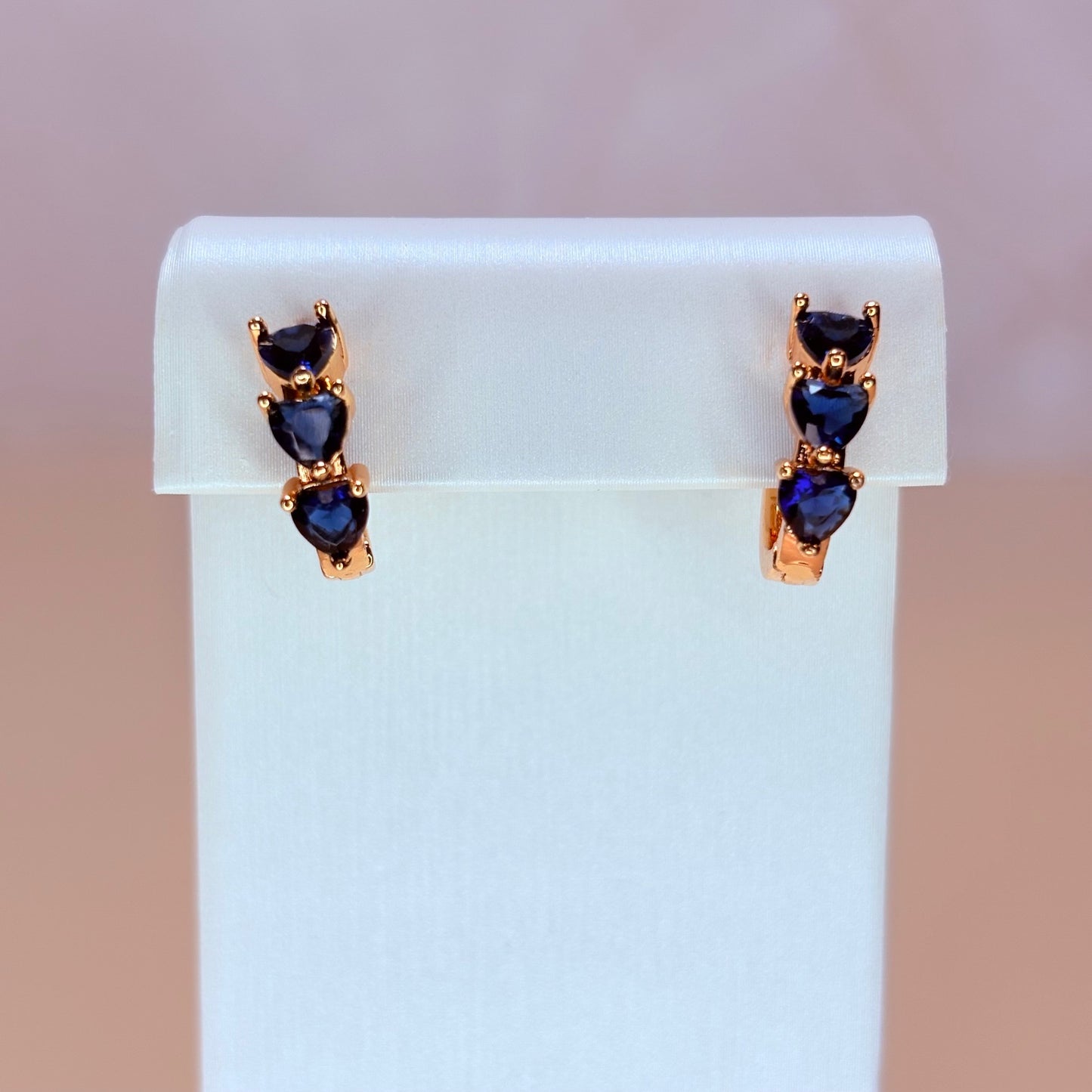 blue heart huggie-style earrings