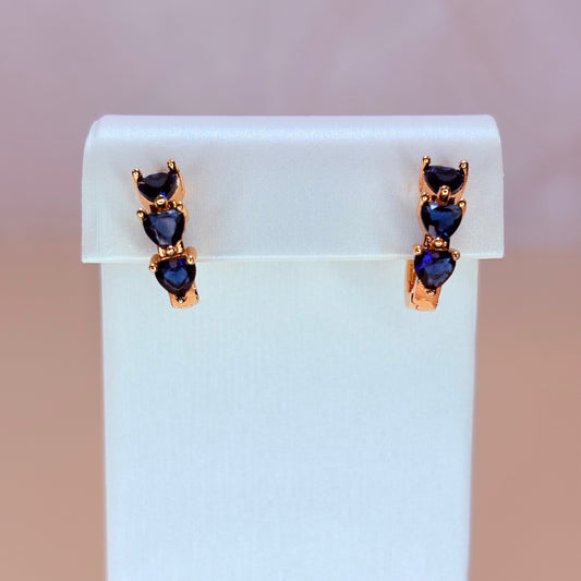 blue heart huggie-style earrings