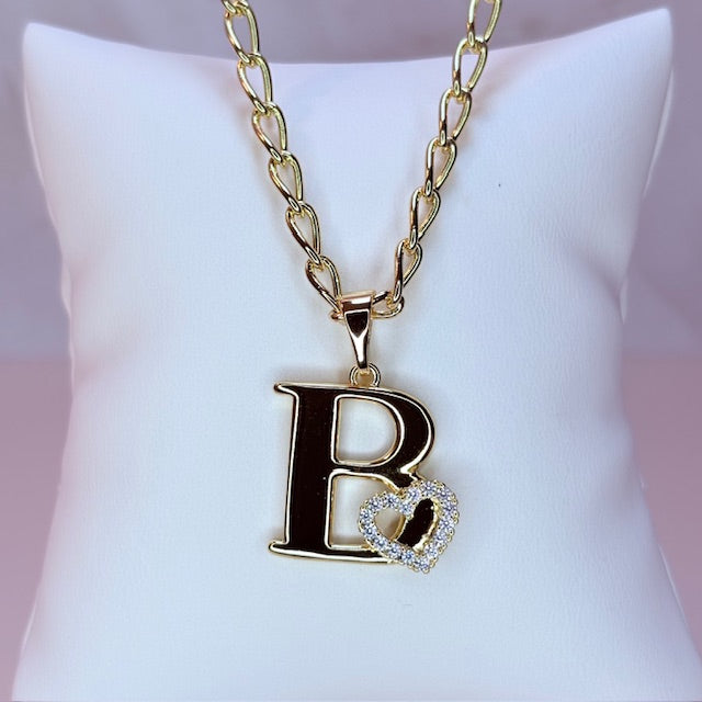 gold initial with pave heart