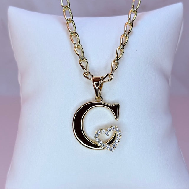 gold initial with pave heart