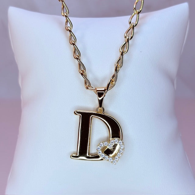 gold initial with pave heart