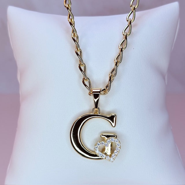 gold initial with pave heart