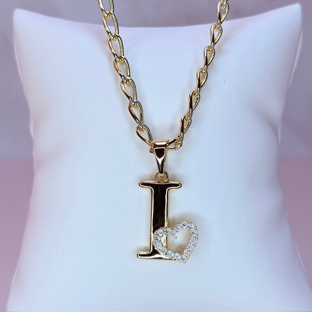 gold initial with pave heart
