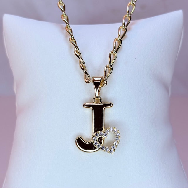 gold initial with pave heart