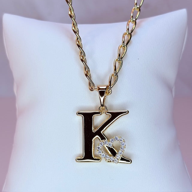 gold initial with pave heart