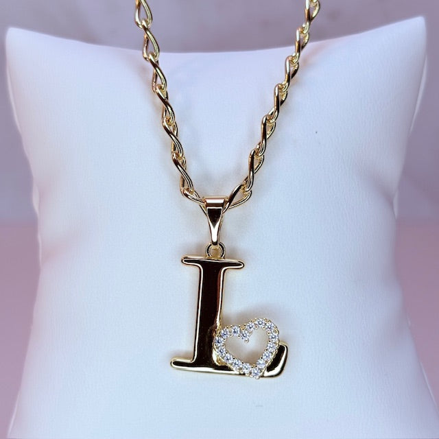 gold initial with pave heart