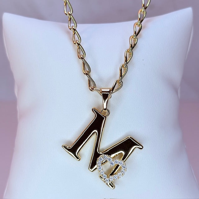 gold initial with pave heart