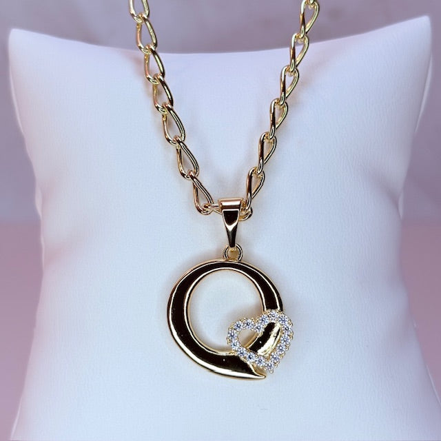 gold initial with pave heart