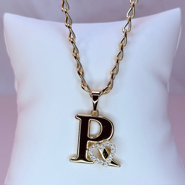gold initial with pave heart