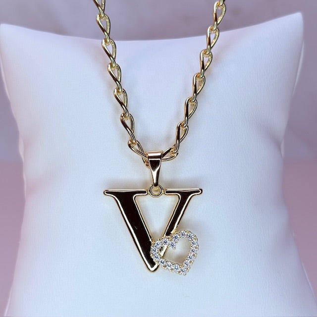 gold initial with pave heart