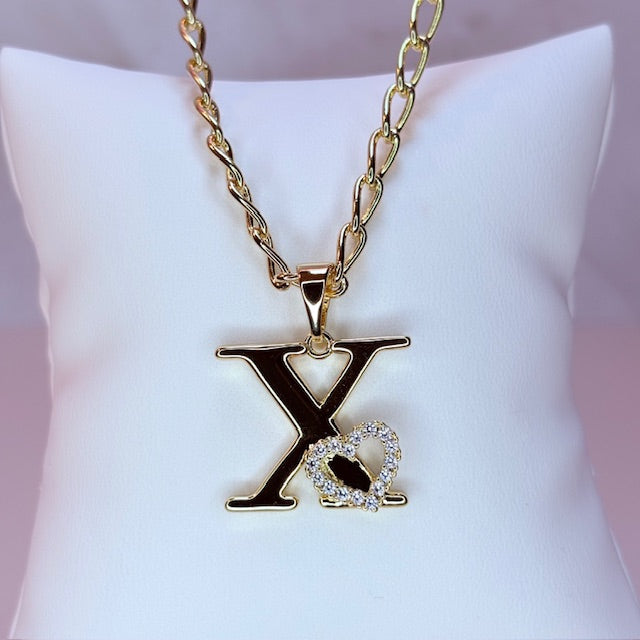 gold initial with pave heart
