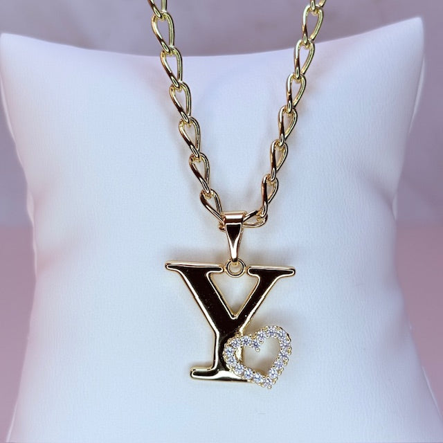 gold initial with pave heart
