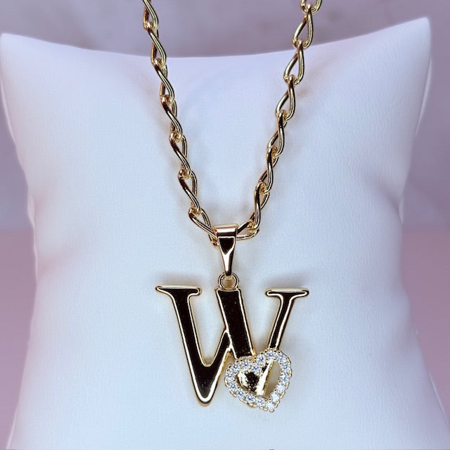 gold initial with pave heart