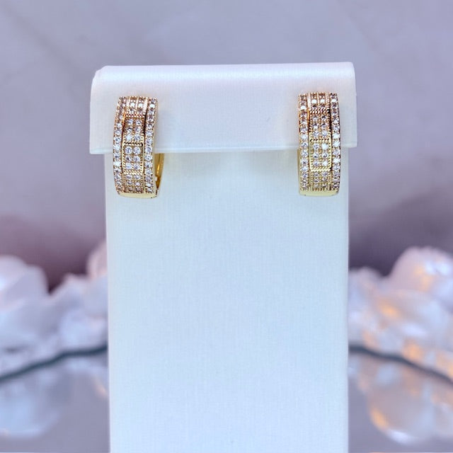 iced out luxe huggie earrings