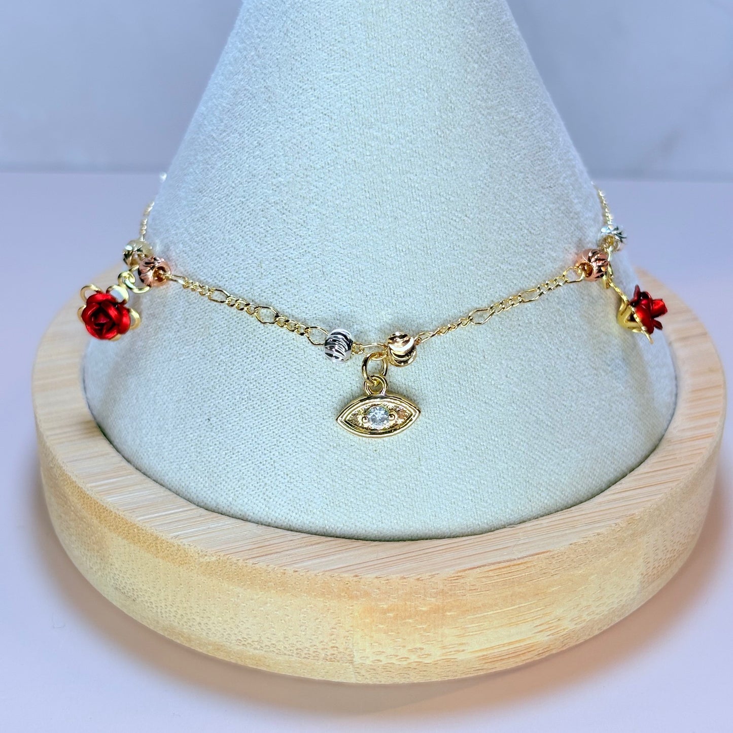 roses and eye charm bracelet