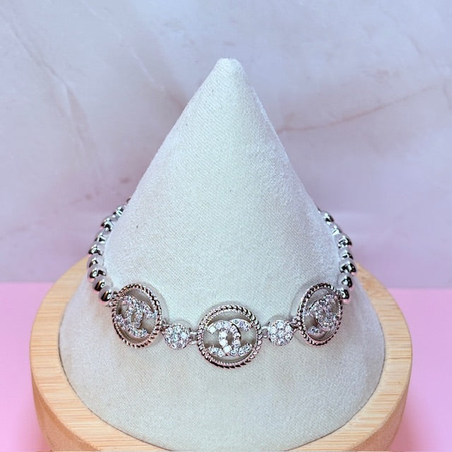 silver "cc" bracelet