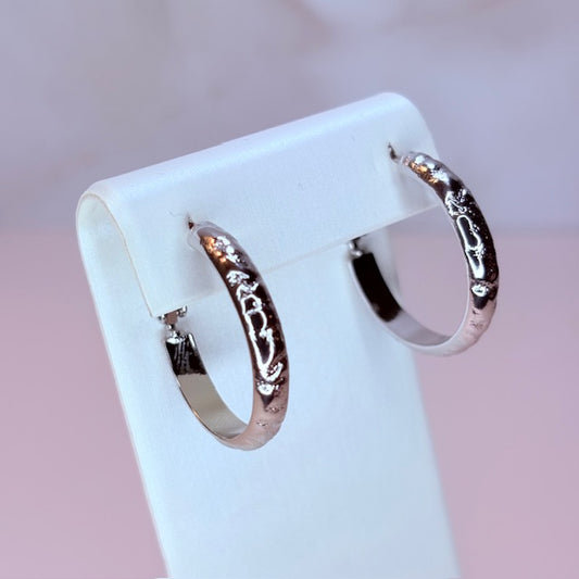 silver metal hoops