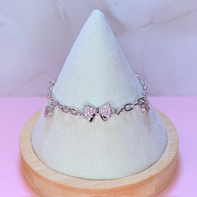 silver pink bow bracelet