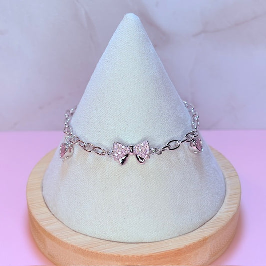 silver pink bow bracelet