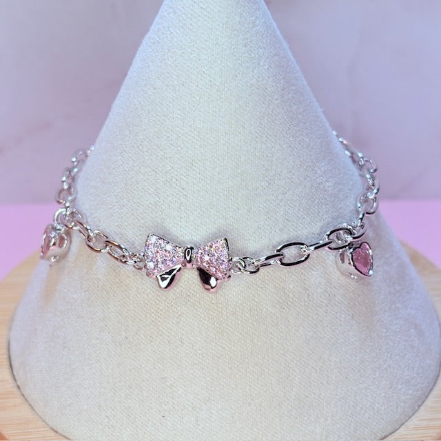 silver pink bow bracelet