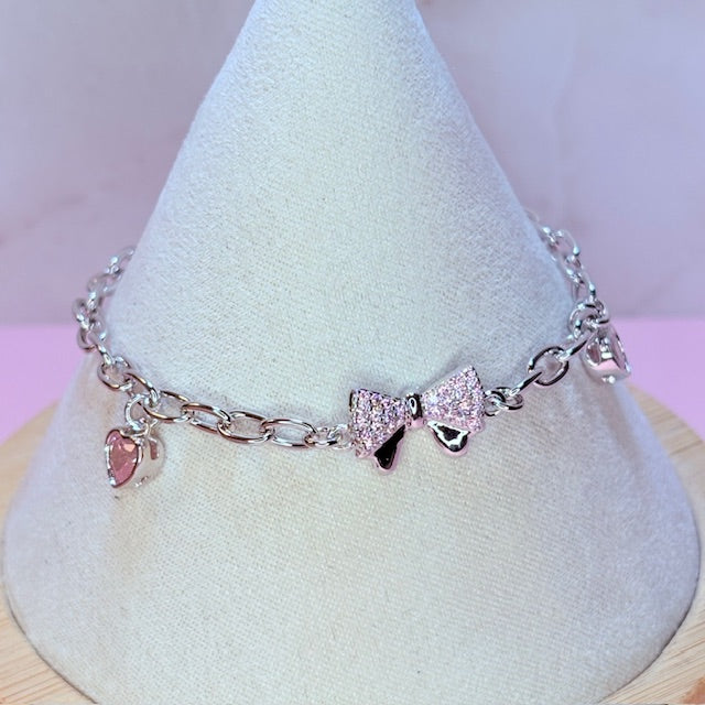 silver pink bow bracelet