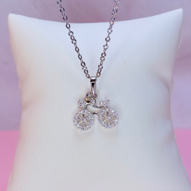 silver sparkle bicycle necklace