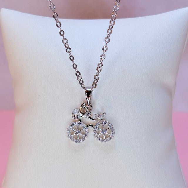 silver sparkle bicycle necklace