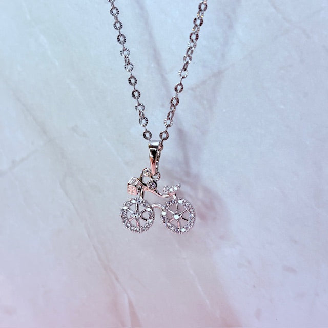 silver sparkle bicycle necklace