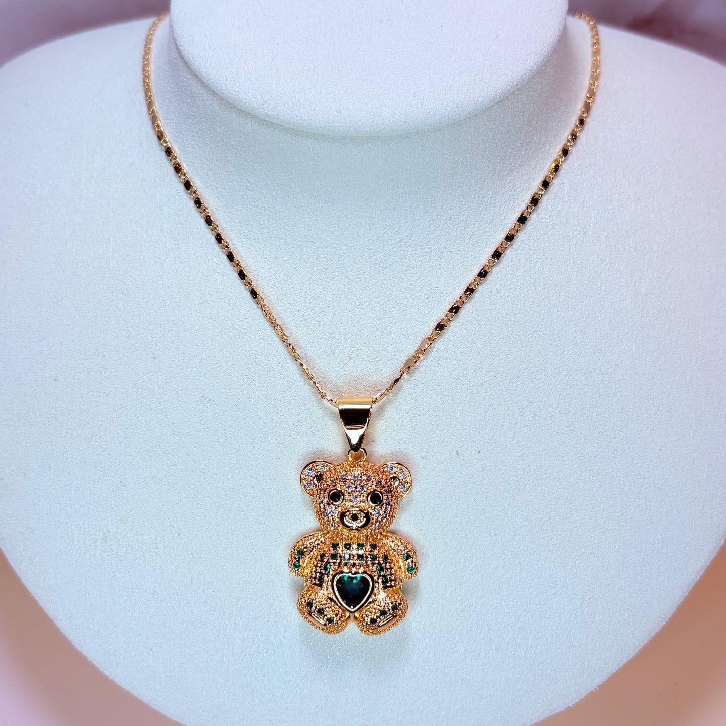 teddy with green heart necklace