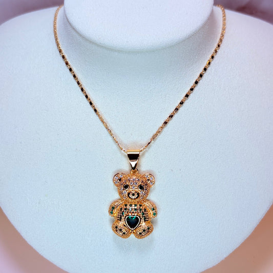 teddy with green heart necklace