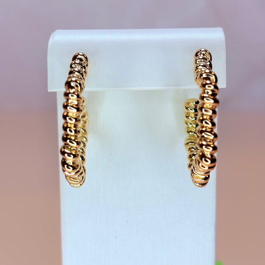 west star hoop-style earrings