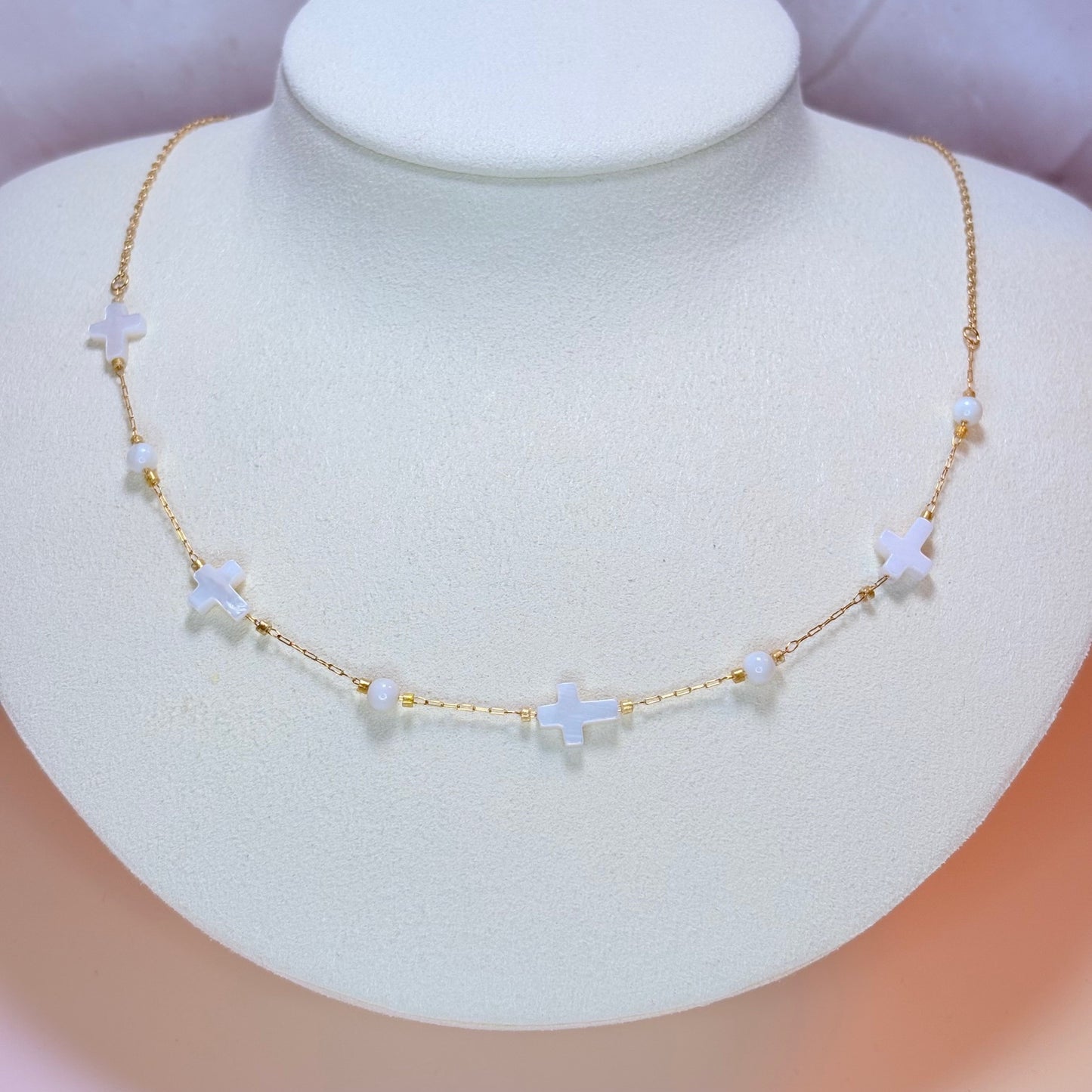 white cross necklace