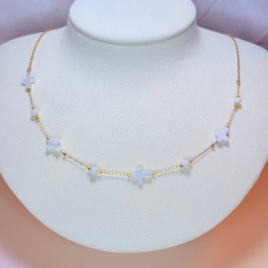 white cross necklace